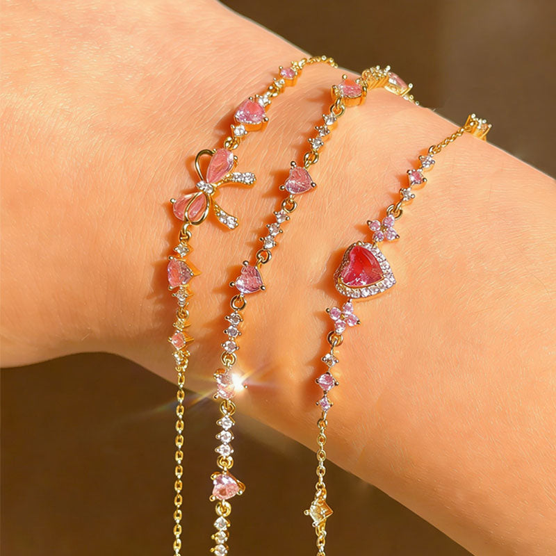 💖✨ Sjarmerende hjertearmbånd til henne – delikat og glitrende hverdagssmykke med feminin eleganse! ✨👛